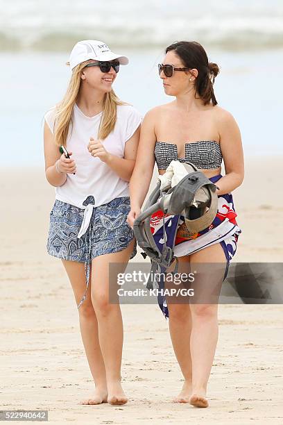 Glenn and Sara McGrath pictured enjoying a beach outing with their family on April 18, 2016 in Byron Bay, Australia.