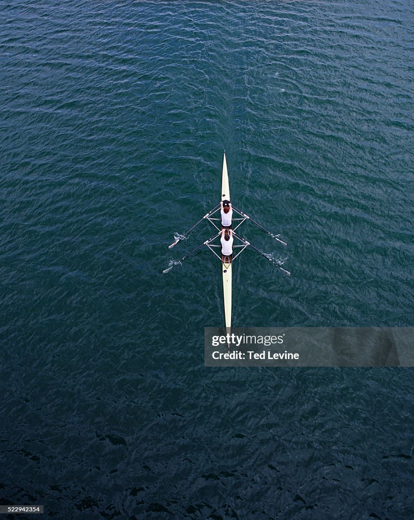 Two Men Rowing