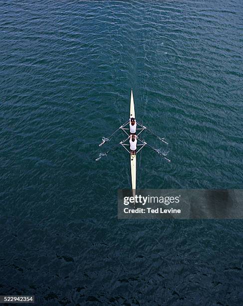 two men rowing - rowboat bildbanksfoton och bilder