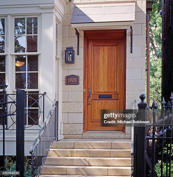 steps and front door of townhouse - house number stock pictures, royalty-free photos & images