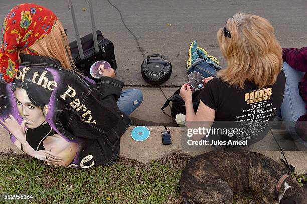 Sheila Clayton, left and Anna Horn, listen to their collection of Prince CD's on their boombox outside of Paisley Park on April 21, 2016 in...