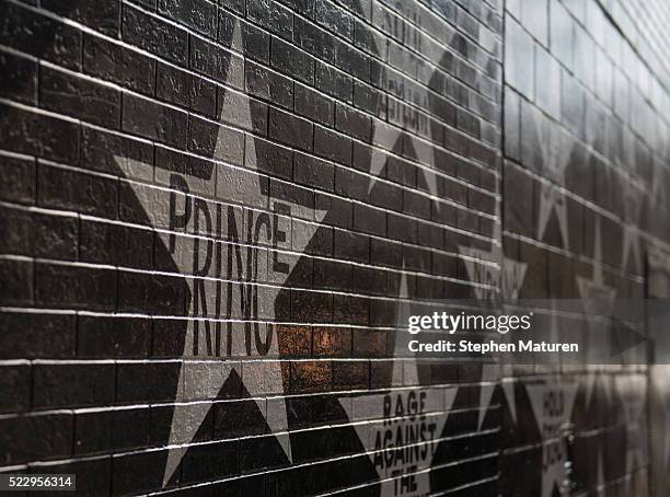 The "Prince" star on the wall outside First Avenue nightclub has become the site of a memorial for Prince on April 21, 2016 in Minneapolis,...