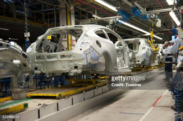 cars on the production line - opel stock pictures, royalty-free photos & images