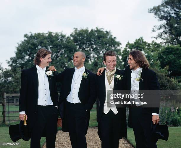 groom with best man and wedding party - best man stock pictures, royalty-free photos & images