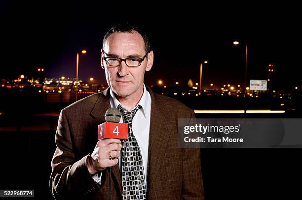 Legman 31,658 News Reporter On Location Stock Photos, High-Res Pictures, and ...
