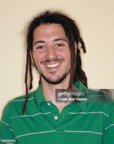 young man with dreadlocks - dreadlocks stock-fotos und bilder