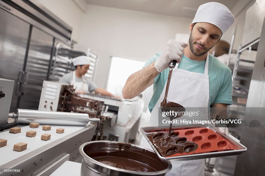 Worker in manufacture of chocolates