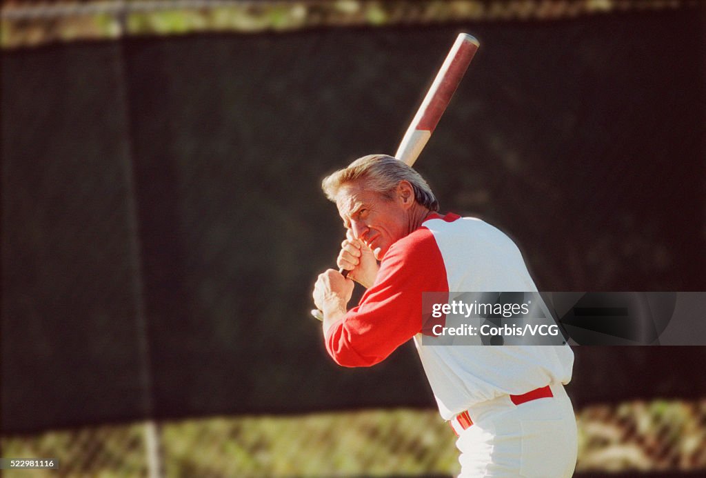 Man Holding Baseball Bat