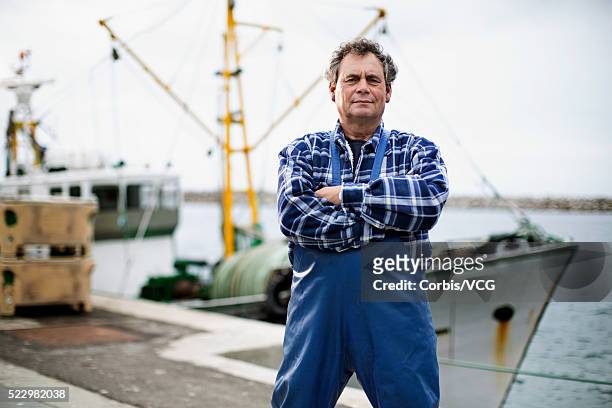 portrait of fisherman - pêcheur photos et images de collection
