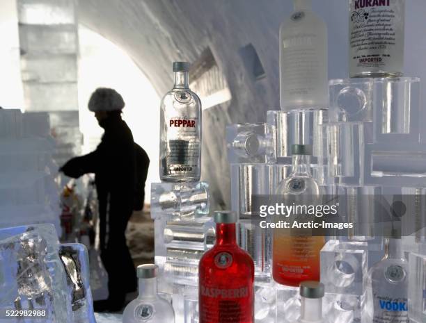 bottles of absolut vodka in the absolut bar in the icehotel - vodka stock pictures, royalty-free photos & images
