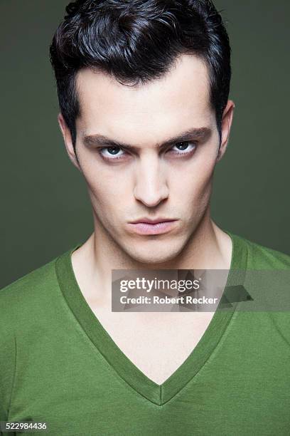 serious young man - robert madden stock pictures, royalty-free photos & images