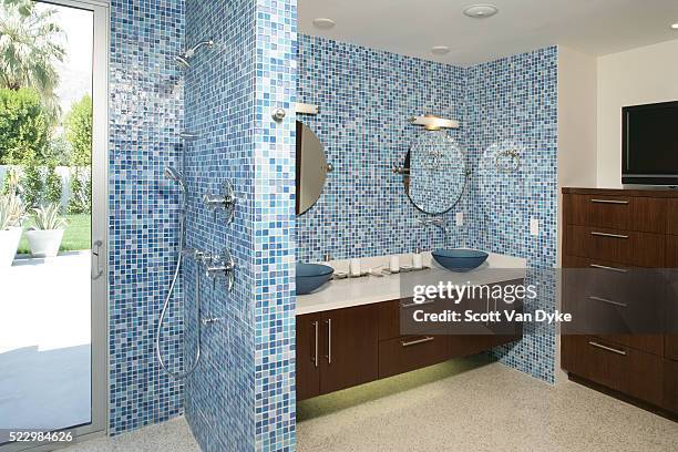 blue tilework in contemporary bathroom - blue bathroom stock-fotos und bilder