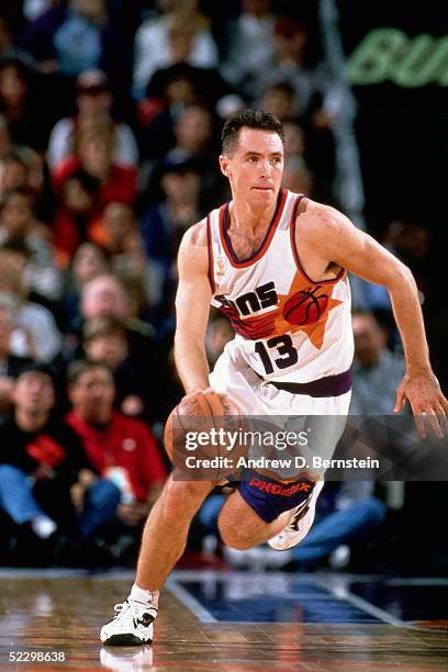 Steve Nash of the Phoenix Suns drives to the basket against the Los Angeles Lakers circa 1997 during an NBA game at America West Arena in Phoenix,...