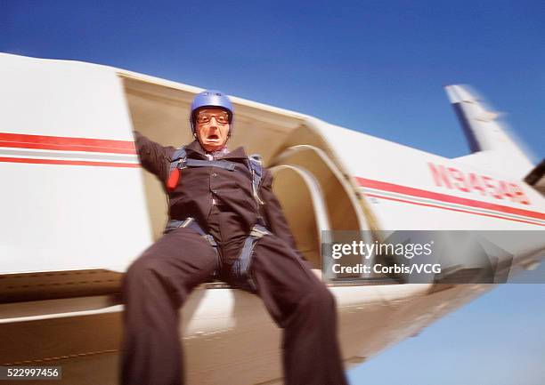 scared skydiving businessman - sky dive stock pictures, royalty-free photos & images