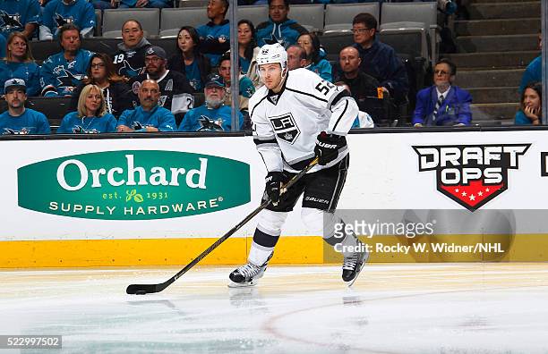 Luke Schenn of the Los Angeles Kings skates with the puck against the San Jose Sharks in Game Three of the Western Conference First Round during the...