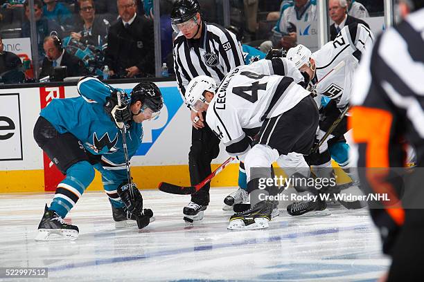 Vincent Lecavalier of the Los Angeles Kings faces off against Patrick Marleau of the San Jose Sharks in Game Three of the Western Conference First...