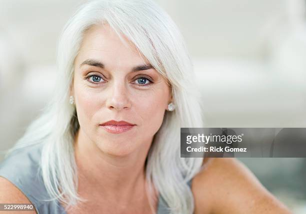 grayhaired woman - young woman grey hair stock pictures, royalty-free photos & images