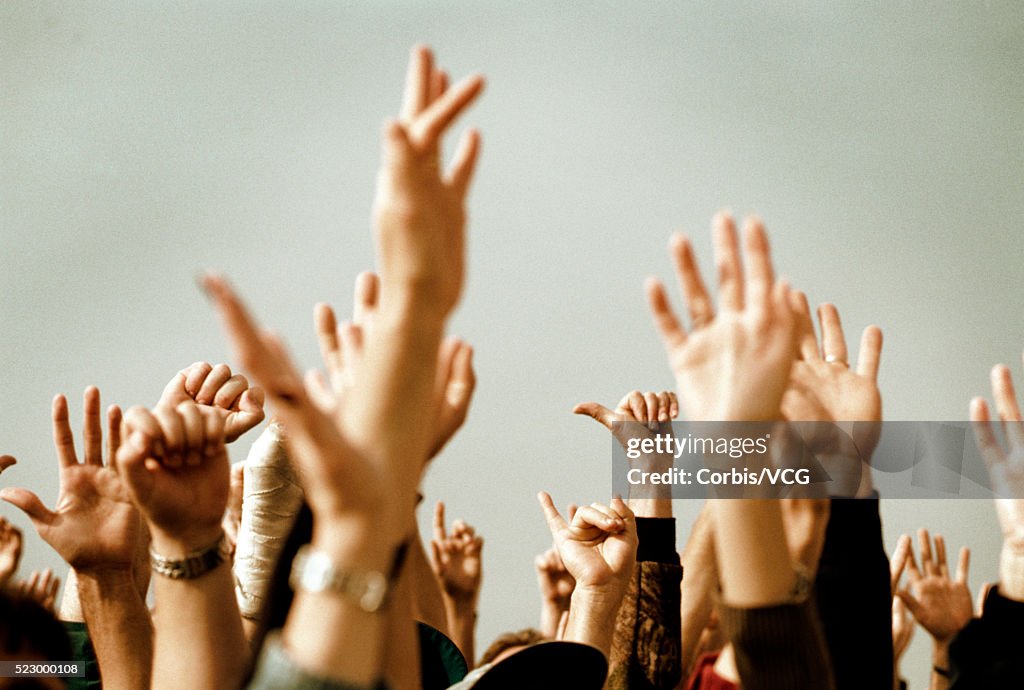 Crowd Raising Their Hands High-Res Stock Photo - Getty Images