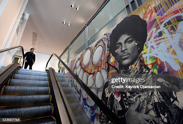 Mural featuring an image of Prince that was created by Chris Brown as a tribute to his influences is placed in the lobby of Grammy museum on April 21...