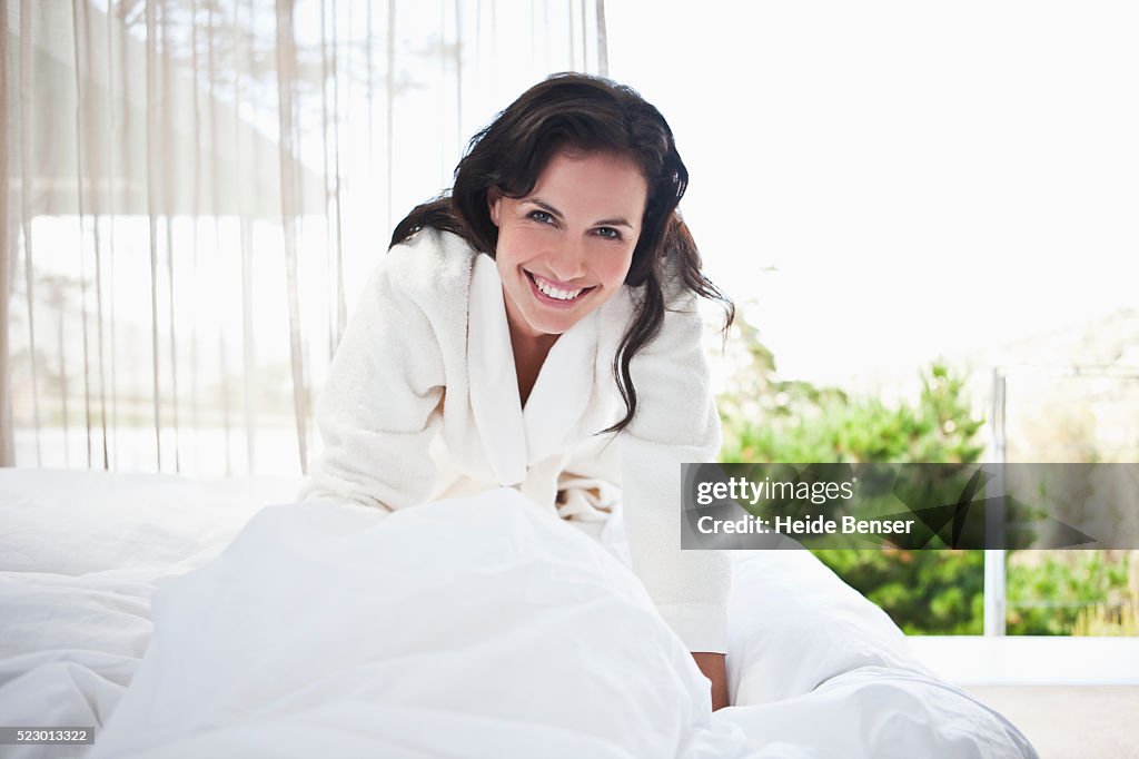 Woman getting out of bed