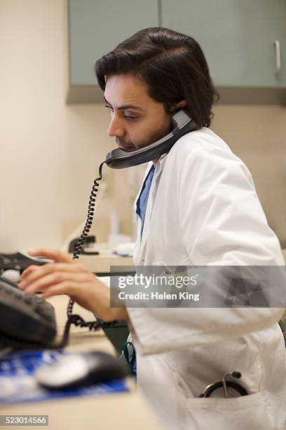 Doctors Ringing Phone Indian Doctor On Phone Call Photos and Premium High Res Pictures ...