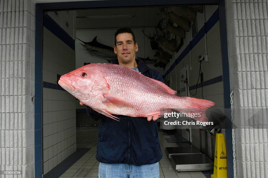 Man Holding Fish