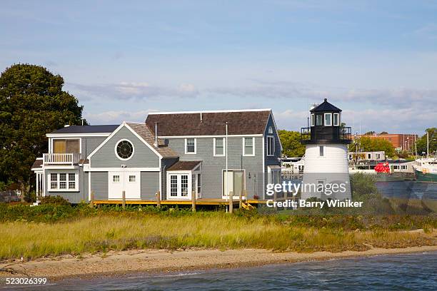 lighthouse near residence, hyannis - hyannis port stock pictures, royalty-free photos & images