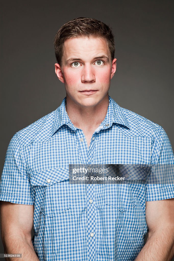 Studio portrait of young man