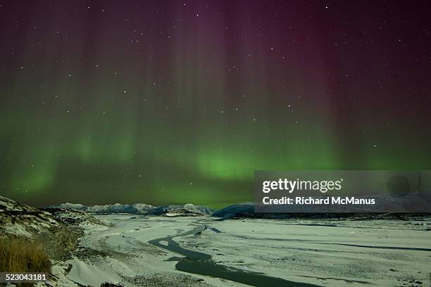 northern lights over kangerlussuaq - kangerlussuaq stock pictures, royalty-free photos & images