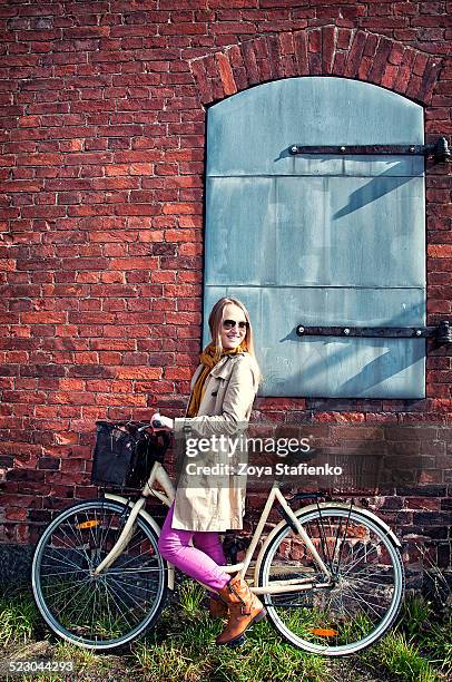 girl on bicycle - suomenlinna stock pictures, royalty-free photos & images