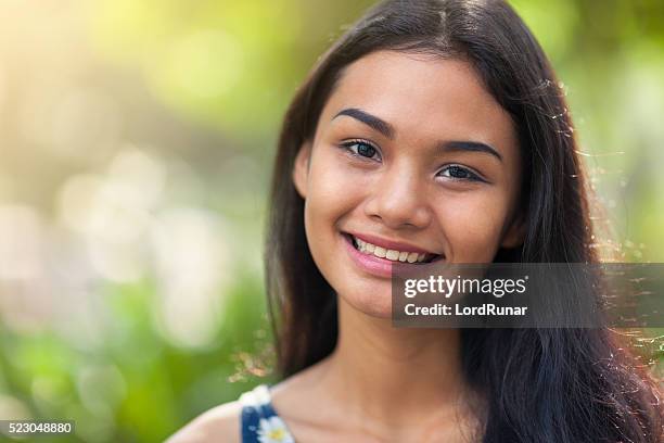 summer portrait of a young woman - filipino girl stockfoto's en -beelden