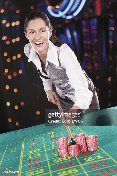 delighted croupier - casino worker ストックフォトと画像