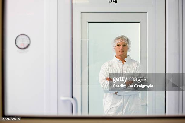 laboratory technician - white suit stock pictures, royalty-free photos & images