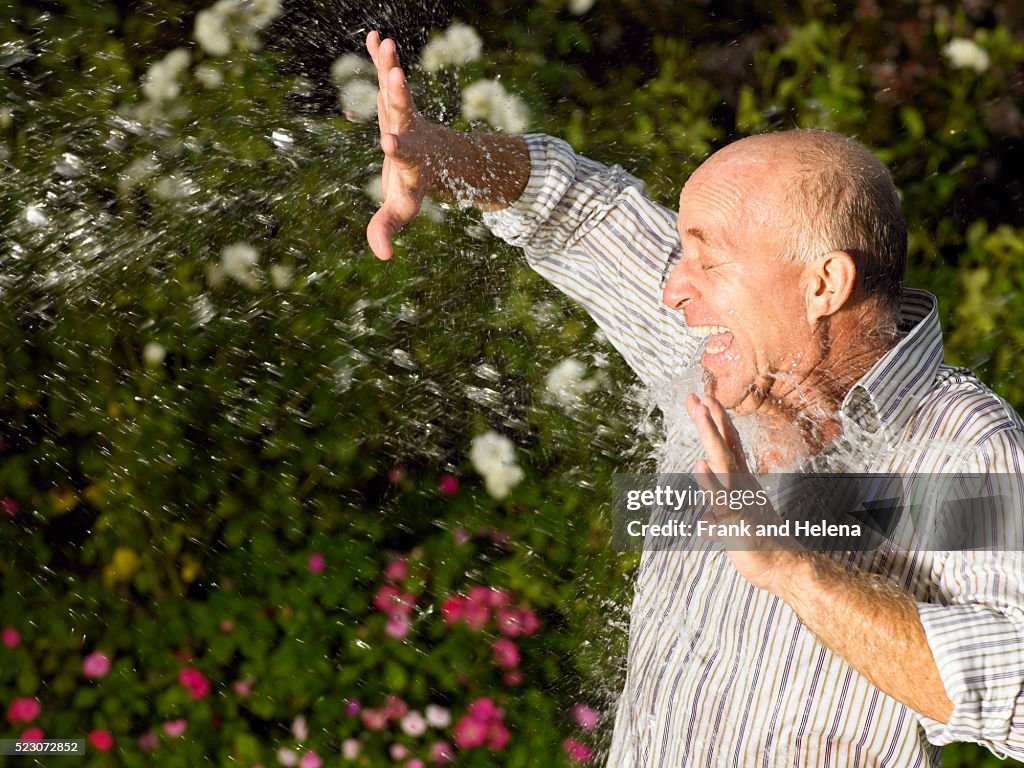 Water Getting Sprayed Man Getting Sprayed By Water High-Res Stock Photo - Getty Images