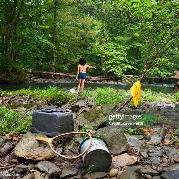 young woman fishing in river, coatesville, pennsylvania, usa - coatesville stock pictures, royalty-free photos & images