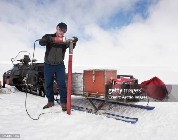 scientist drilling for ice cores on vatnajokull ice cap - geologist stock pictures, royalty-free photos & images