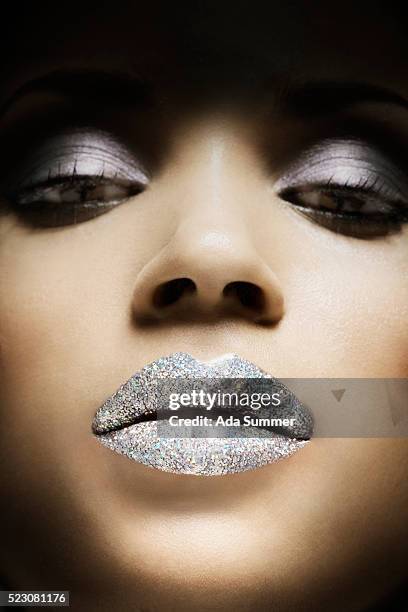woman wearing silver glitter lipstick - silver lipstick stock pictures, royalty-free photos & images