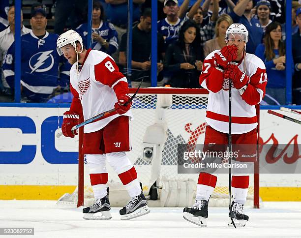 Justin Abdelkader and Brad Richards of the Detroit Red Wings react at the end of a series-ending loss to the Tampa Bay Lightning in Game Five of the...