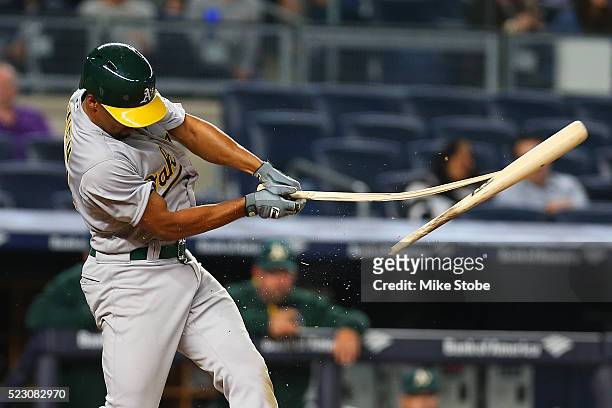 Marcus Semien of the Oakland Athletics breaks his bat during his at bat in the ninth inning against the New York Yankees at Yankee Stadium on April...