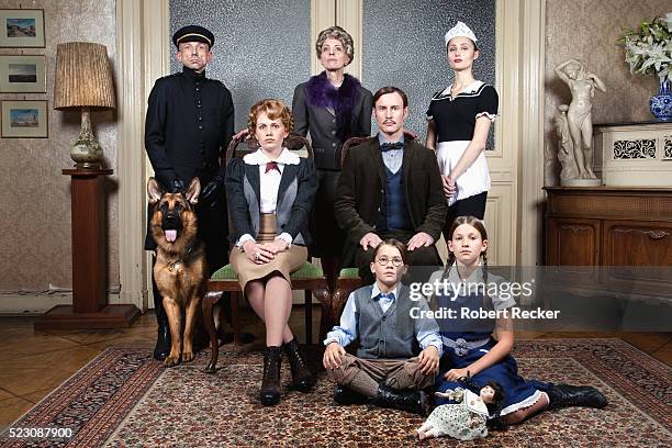 wealthy family in living room - german shepherd white stock pictures, royalty-free photos & images