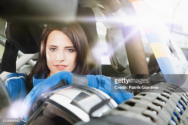 portrait of female stock car driver - women motorsport stock pictures, royalty-free photos & images