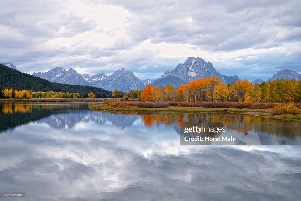 Reflections in Snake River, Teton Range, Mount Moran, centre, Oxbow Bend Turnout, Federal Road 287, Grand Teton National Park, Wyoming, USA