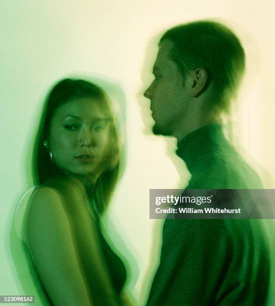 couple in green - asian couple arguing stock-fotos und bilder