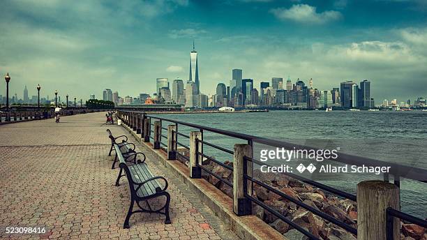 new york city skyline from liberty state park new jersey - june 1 stock pictures, royalty-free photos & images