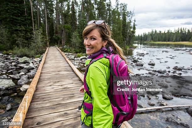 female hiker on boardwalk, jackson, wyoming, usa - jackson wyoming 個照片及圖片檔