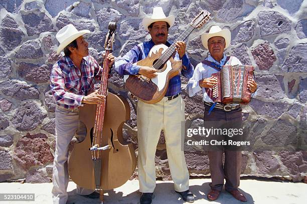 musical trio in mazatlan - accordionist stock pictures, royalty-free photos & images