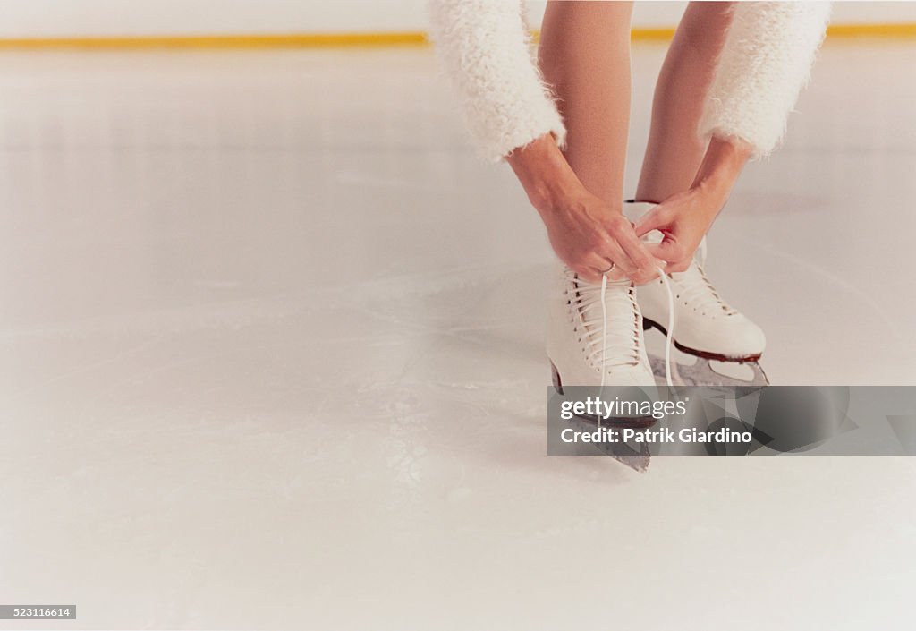 Figure Skater Tying Laces