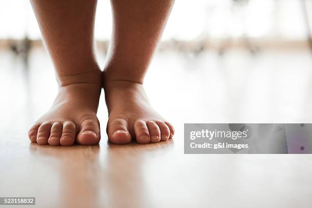 boy's feet - barefoot child stock pictures, royalty-free photos & images