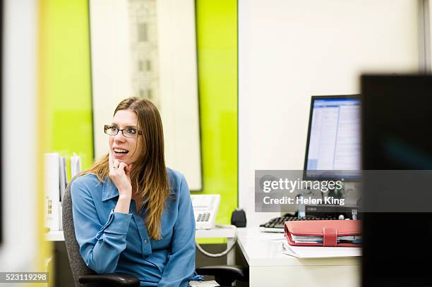businesswoman in office - staring stock pictures, royalty-free photos & images