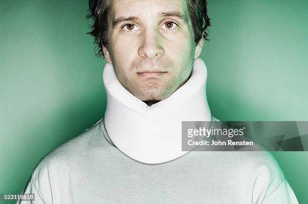 man wearing a neckbrace - halskrause stock-fotos und bilder